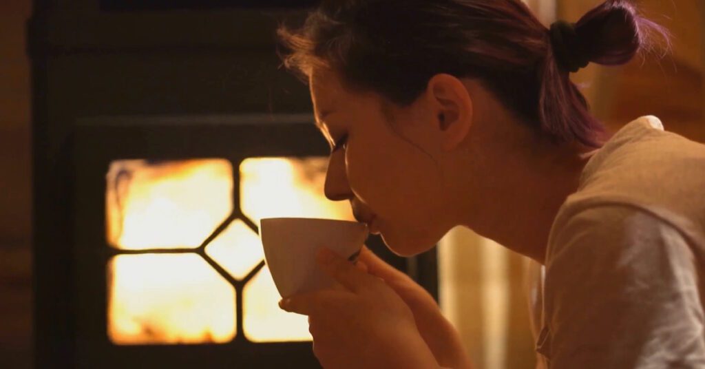 Woman Sipping Tea Burn